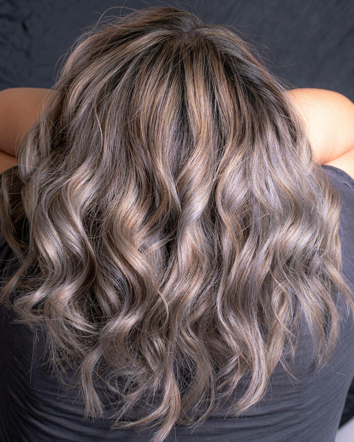 Tousled waves in soft silver and grey tones